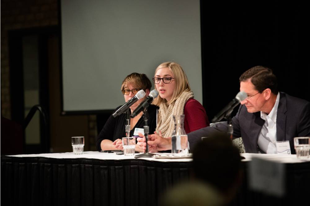 Image 1 of 30 Jordan Chrispell responds to another panelist&#x27;s presentation.